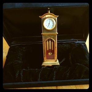 Miniature gold-toned clock